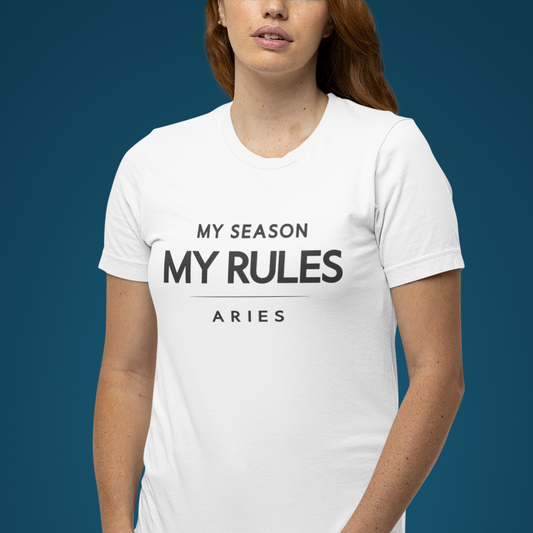 Model wearing white Aries zodiac t-shirt with “My season my rules” bold typography quote