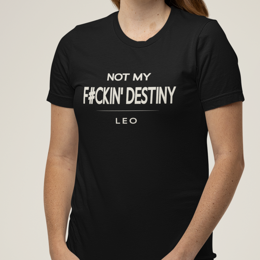 Model wearing Leo zodiac t-shirt with “Not My Fckin' Destiny” typography quote