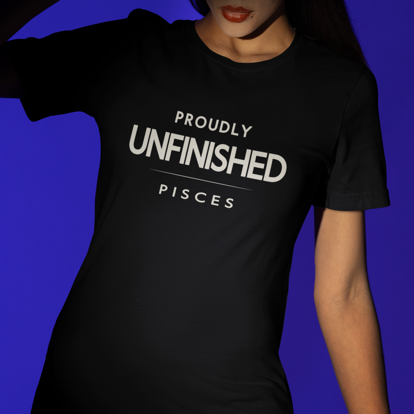 Model wearing black Pisces zodiac t-shirt with Proudly Unfinished slogan
