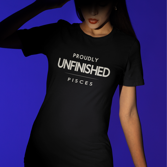 Model wearing black Pisces zodiac t-shirt with Proudly Unfinished slogan