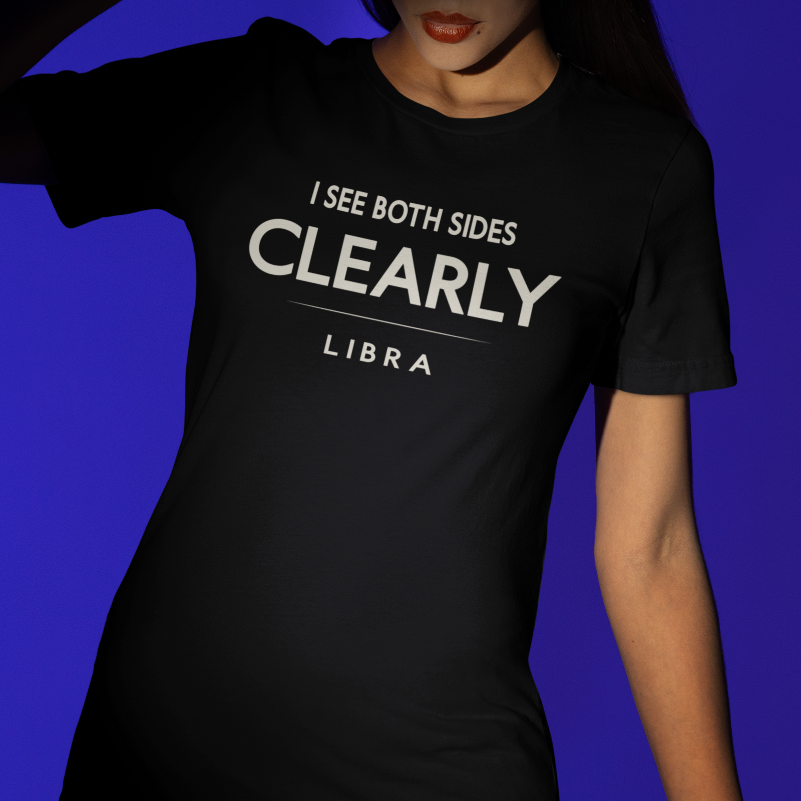Model wearing Libra zodiac t-shirt with “I See Both Sides Clearly” typography quote