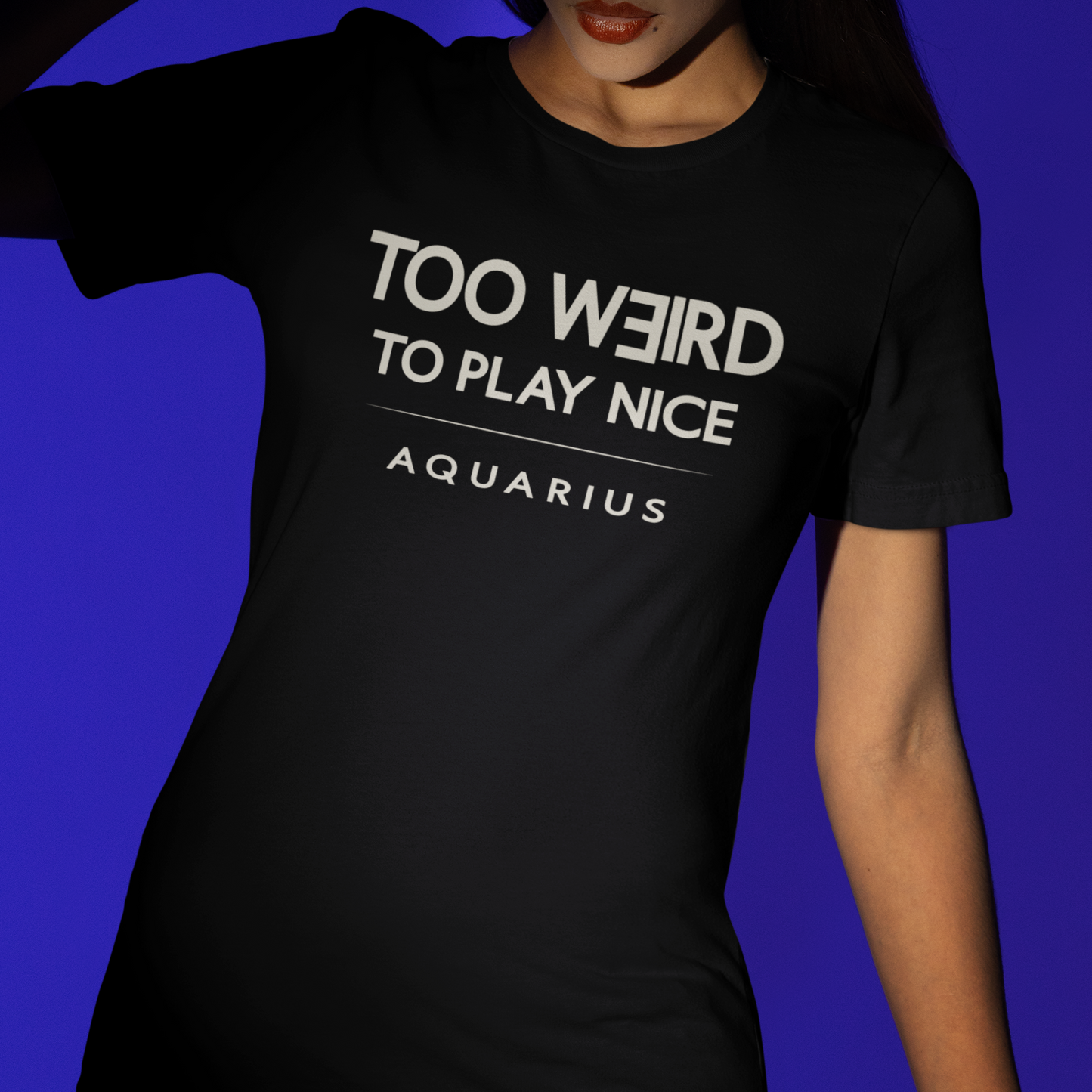 Model wearing Aquarius zodiac t-shirt with “Too Weird to Play Nice” typography quote