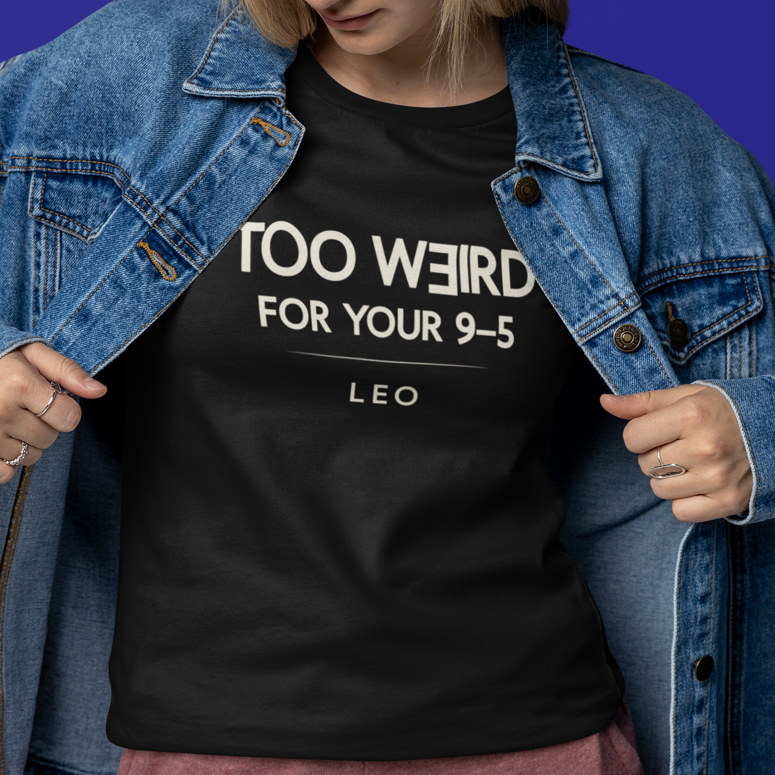 Model wearing Leo zodiac t-shirt with “Too Weird for Your 9–5” typography quote