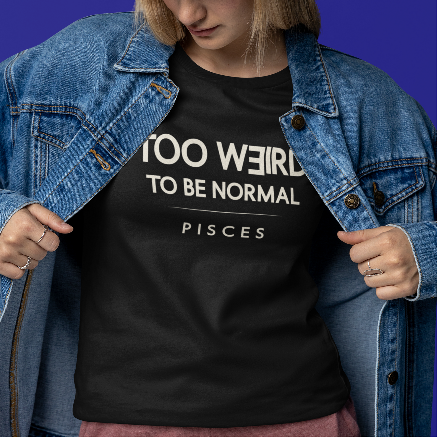 Model wearing Pisces zodiac t-shirt with too weird to be normal typography quote design.