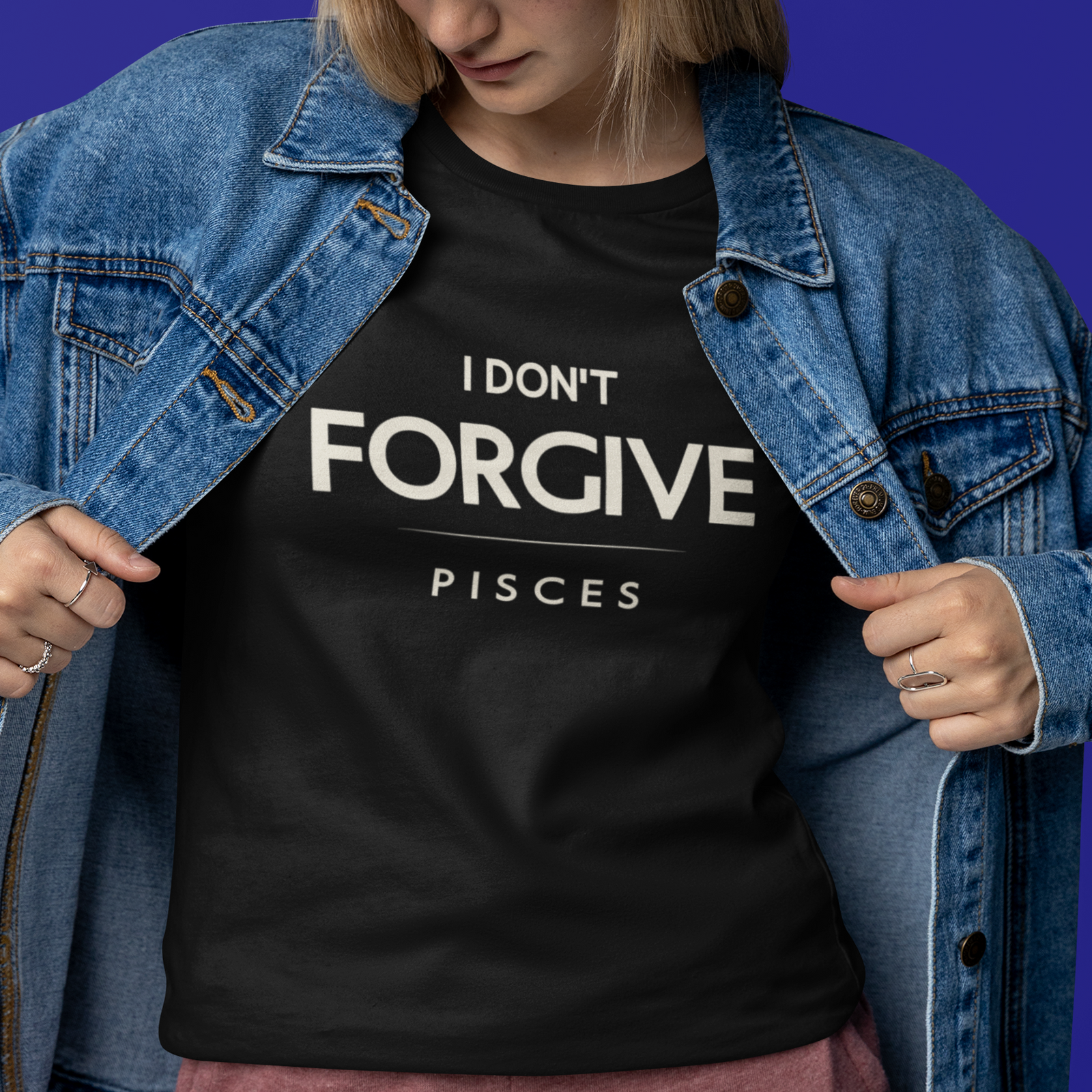 Model wearing Pisces zodiac t-shirt with I Don’t Forgive typography.