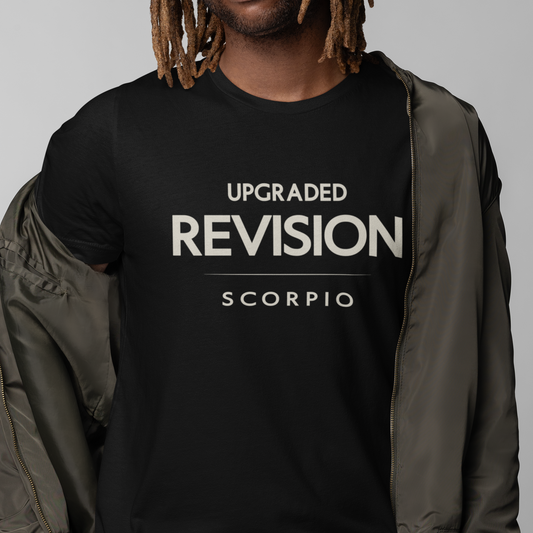 Model wearing Scorpio zodiac t-shirt with “Upgraded Revision” typography quote design