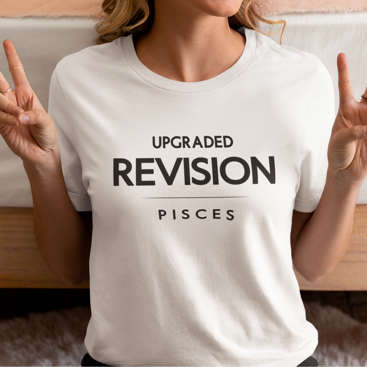 Model wearing Pisces zodiac t-shirt with upgraded revision bold typography quote design.
