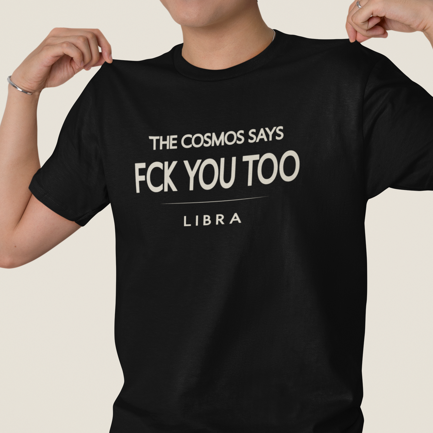 Model wearing Libra zodiac t-shirt with “The Cosmos Says FCK You Too” typography quote