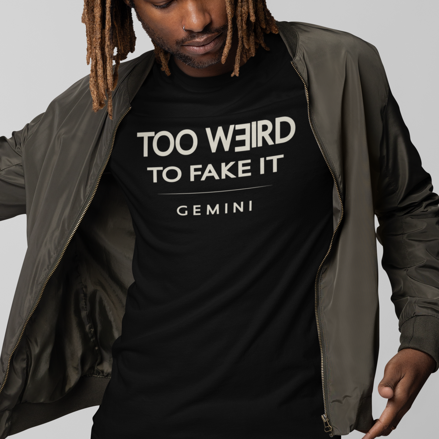 Model wearing Gemini zodiac t-shirt with “Too Weird to Fake It” typography quote design