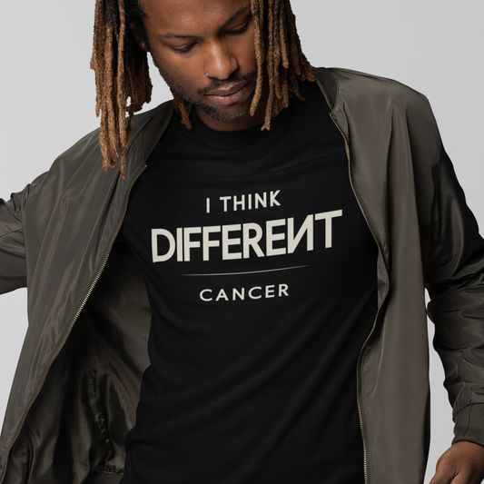Model wearing Cancer zodiac t-shirt with “I Think Different” bold typography quote design