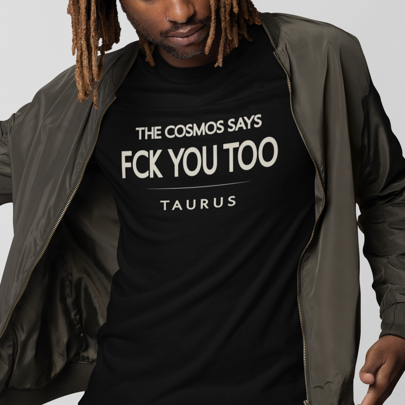 Model wearing Taurus zodiac t-shirt with “The Cosmos Says FCK You Too” typography quote