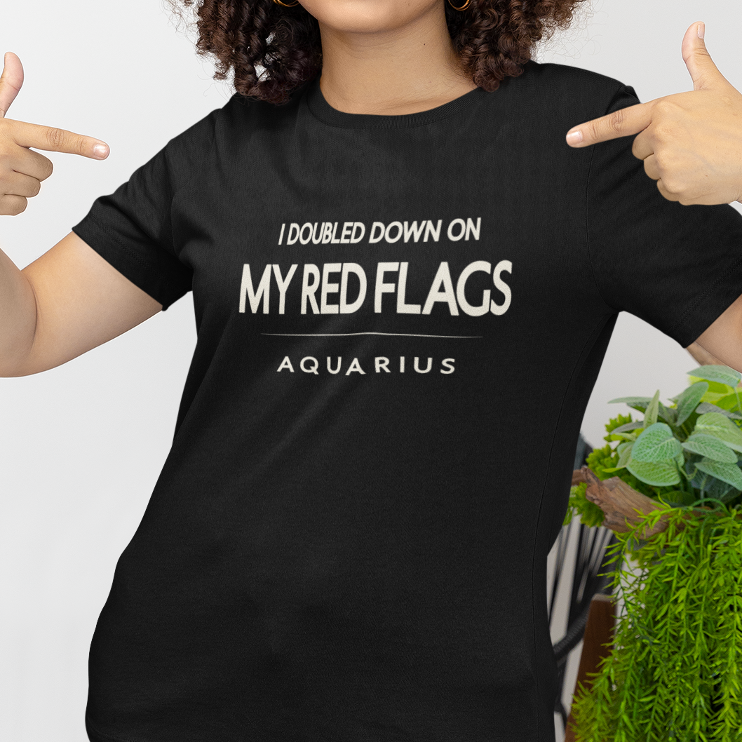 Model wearing Aquarius zodiac t-shirt with “I Doubled Down on My Red Flags” typography quote