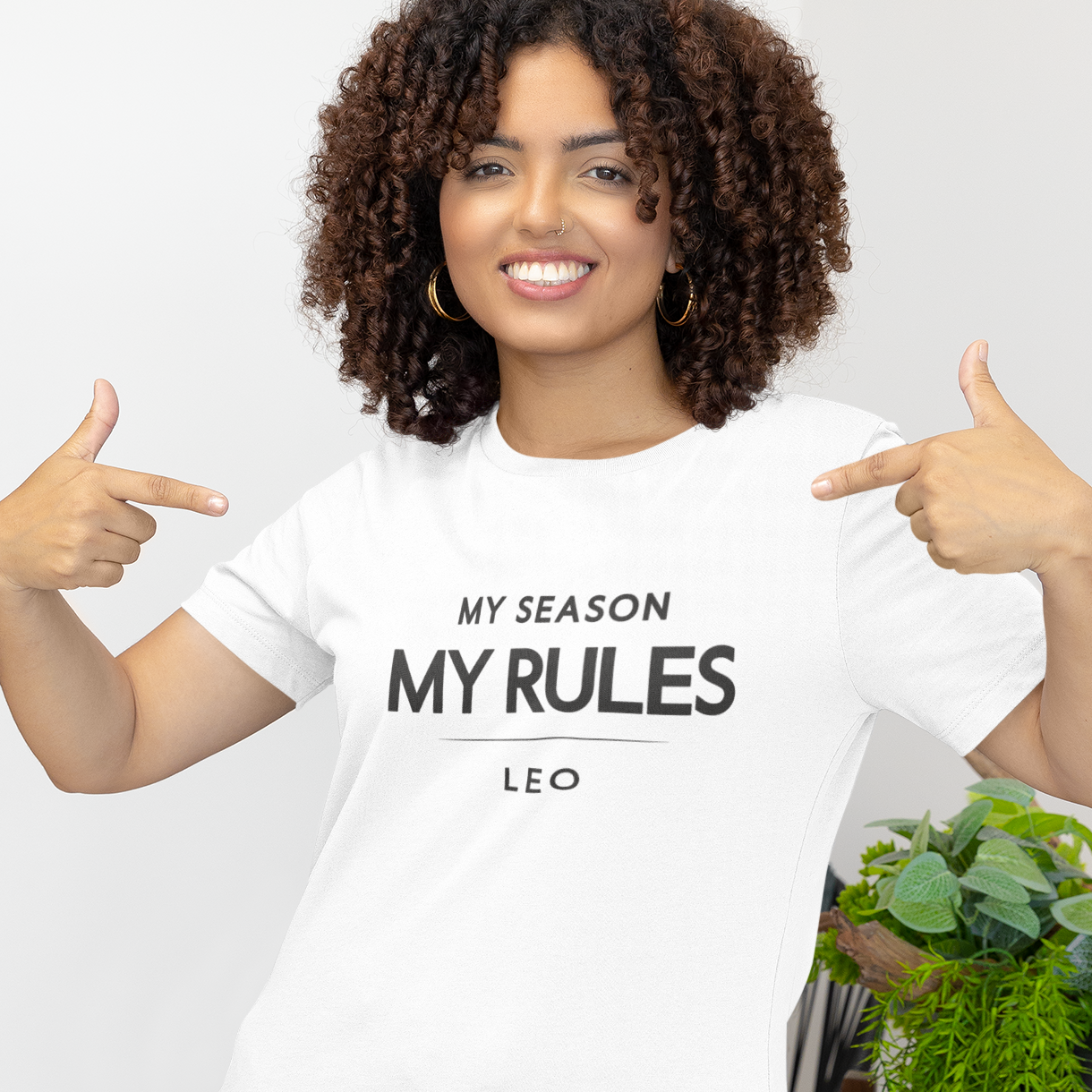 Model pointing at Leo zodiac t-shirt with “My Season My Rules” bold typography quote