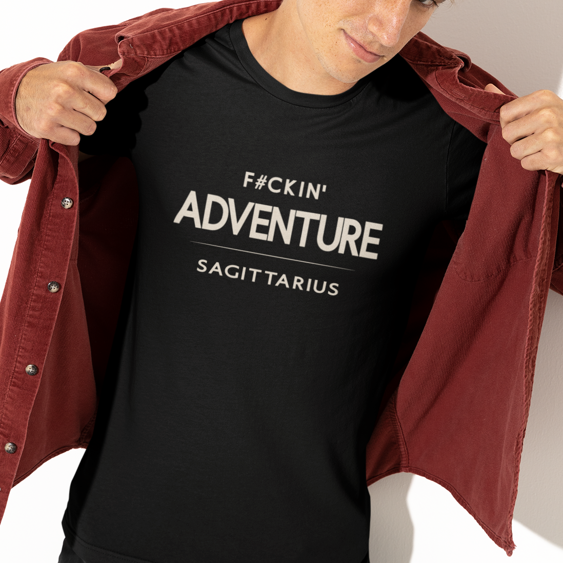Model wearing Sagittarius zodiac t-shirt with “F#ckin’ Adventure” typography quote design