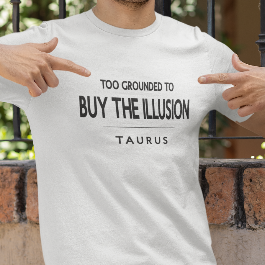 Model wearing Taurus zodiac t-shirt with Too Grounded to Buy the Illusion typography.