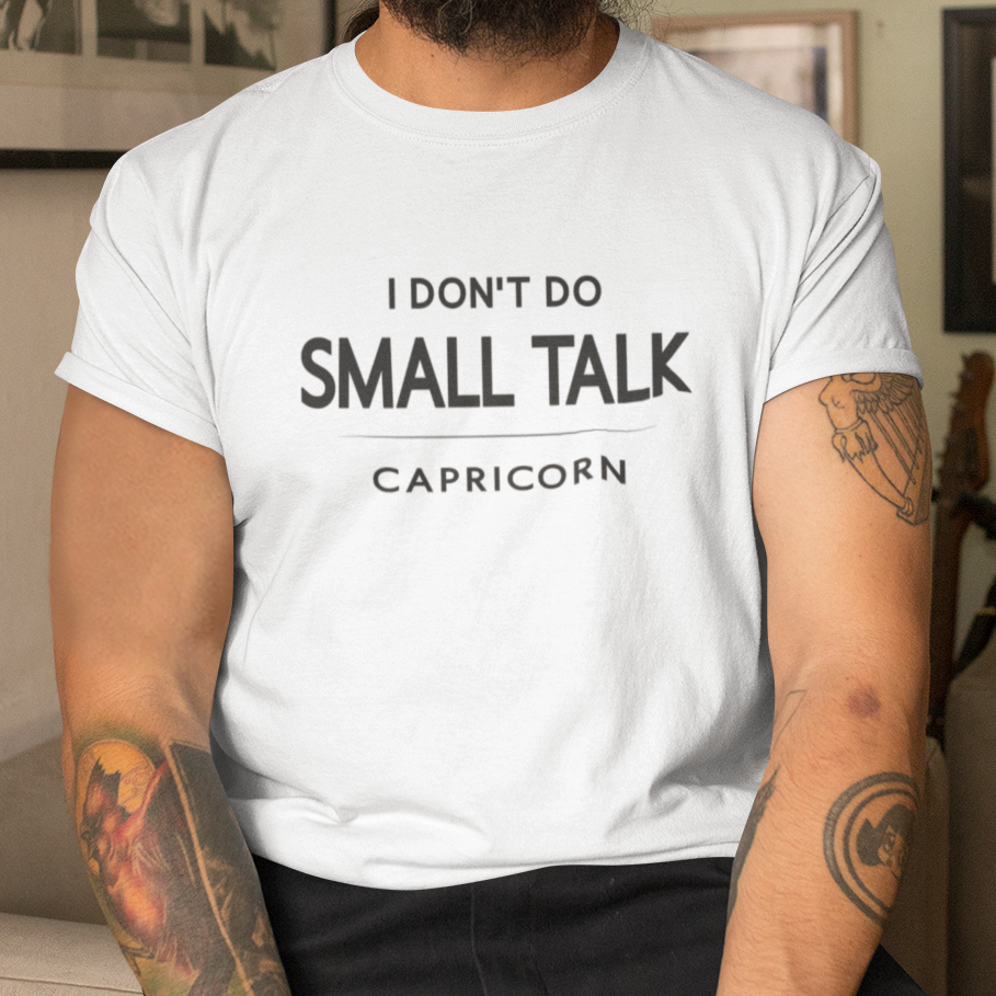 Model wearing Capricorn zodiac t-shirt with “I Don’t Do Small Talk” typography quote design