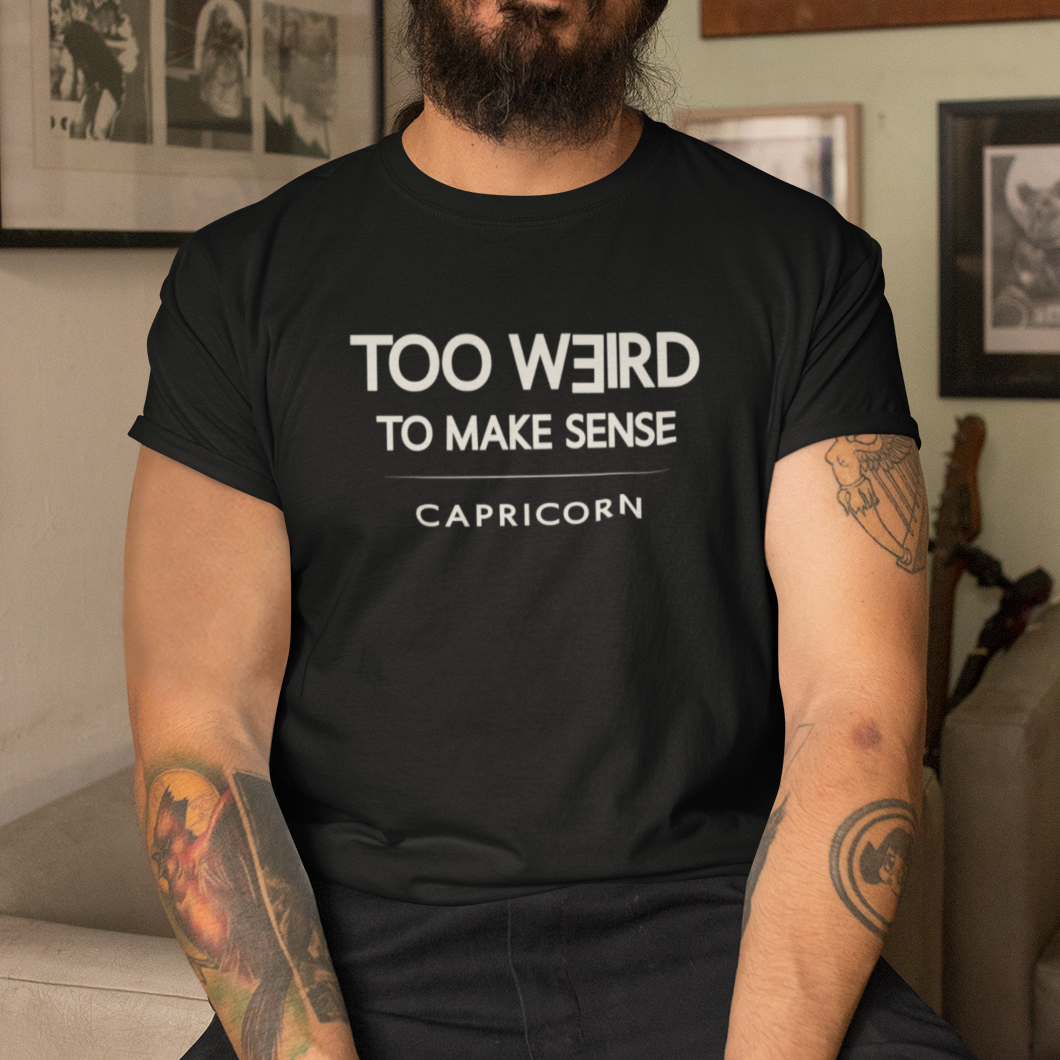 Model wearing Capricorn zodiac t-shirt with “Too Weird to Make Sense” typography quote