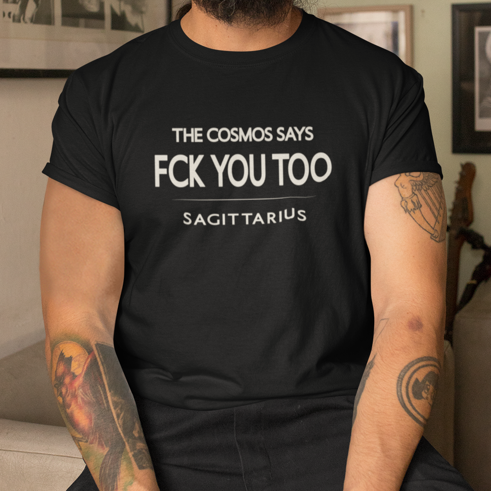 Model wearing Sagittarius zodiac t-shirt with “The Cosmos Says FCK You Too” typography quote