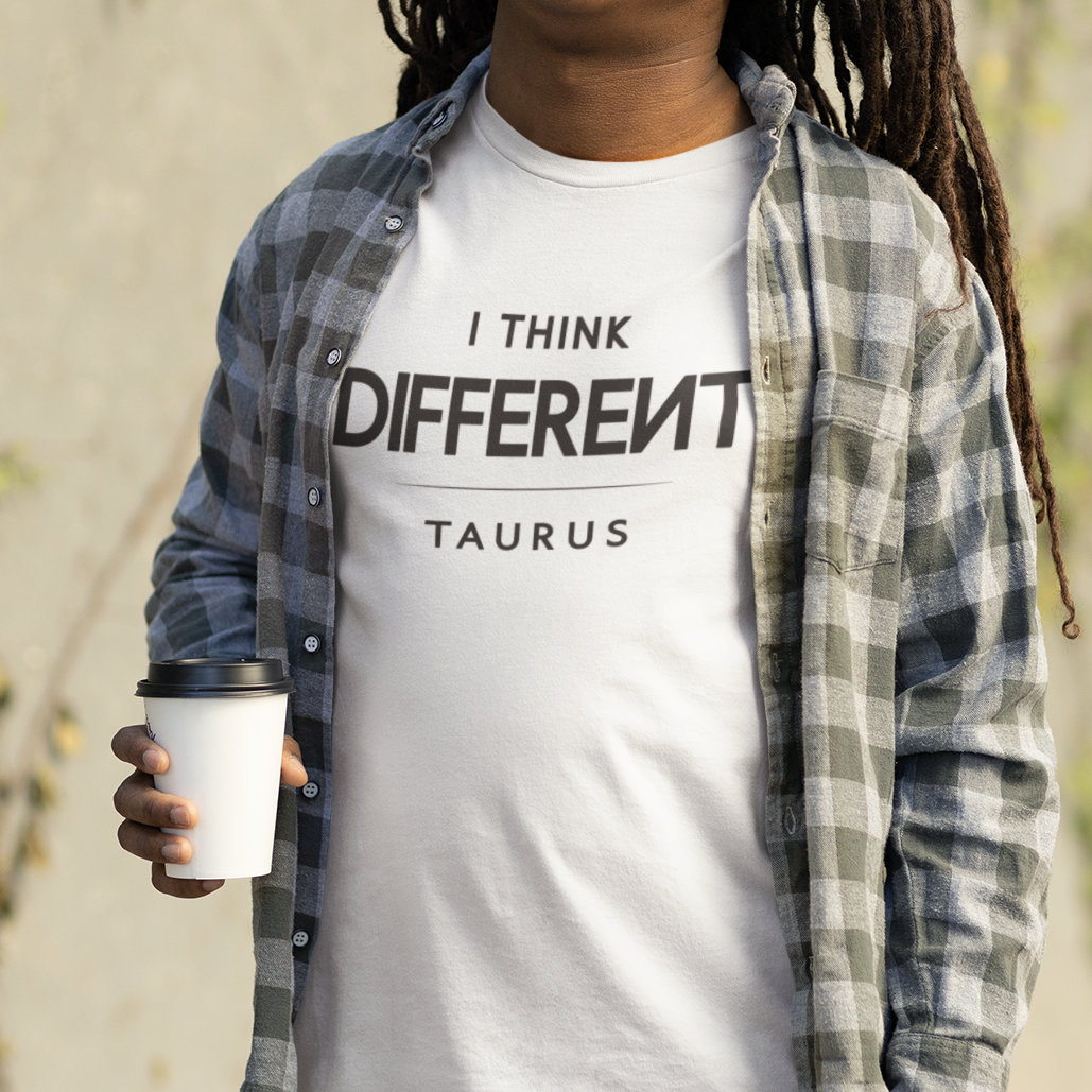 Model wearing Taurus zodiac t-shirt with “I Think Different” typography quote design