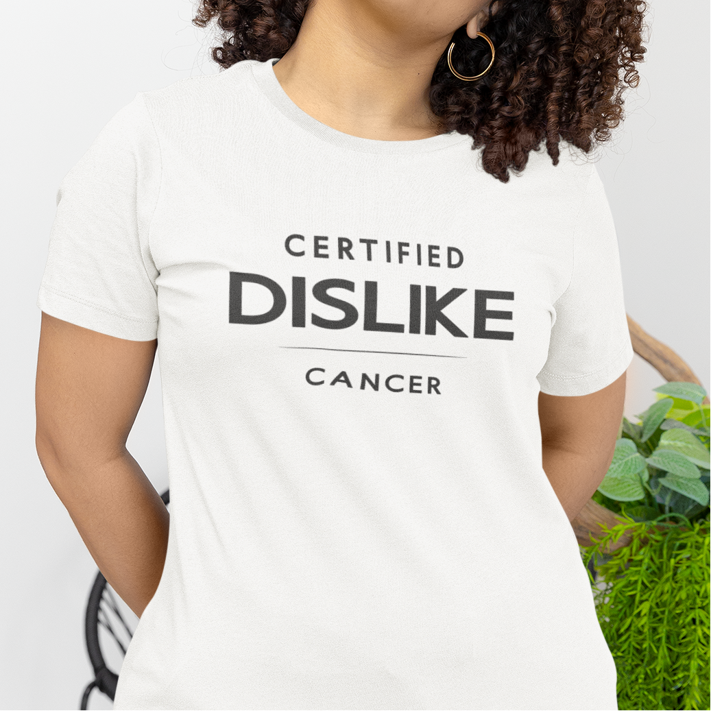 Model wearing Cancer zodiac t-shirt with bold Certified Dislike typography.