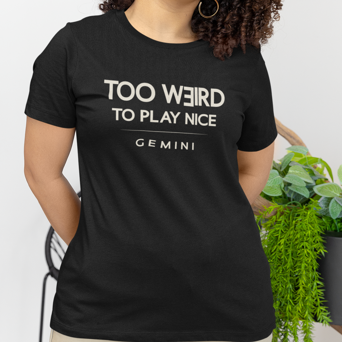 Model wearing Gemini zodiac t-shirt with “Too Weird to Play Nice” typography quote