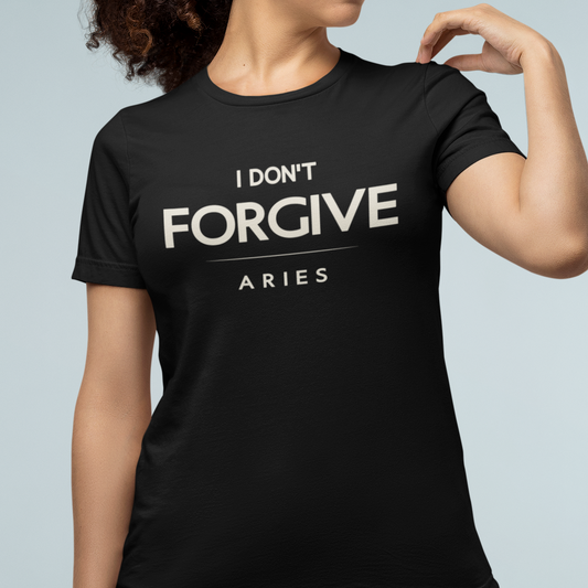 Model wearing Aries zodiac t-shirt with “I don’t forgive” bold typography quote design.