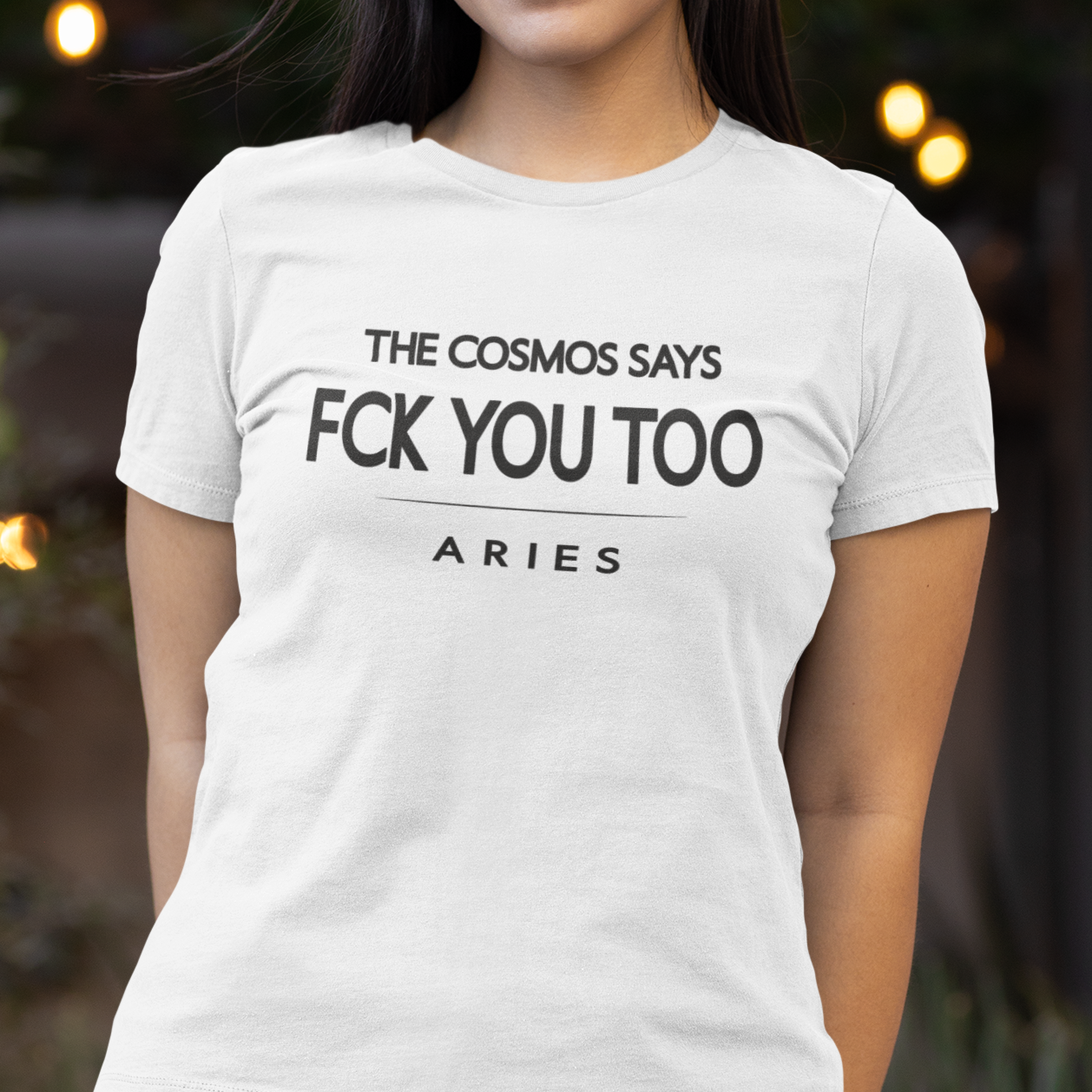 Model wearing Aries zodiac t-shirt with bold typography quote “The cosmos says FCK you too”.