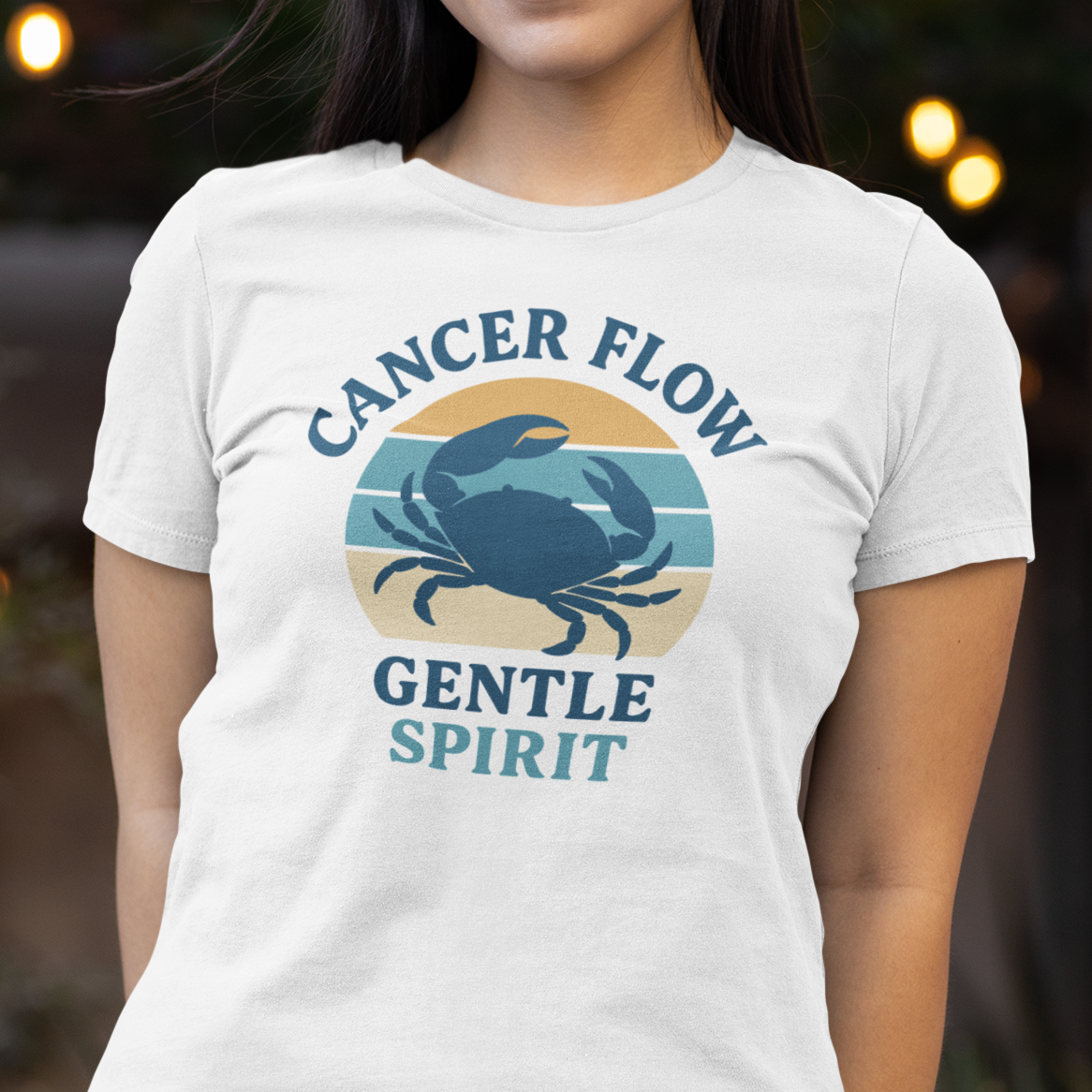 Model wearing Cancer zodiac t-shirt with retro crab graphic and gentle spirit text.