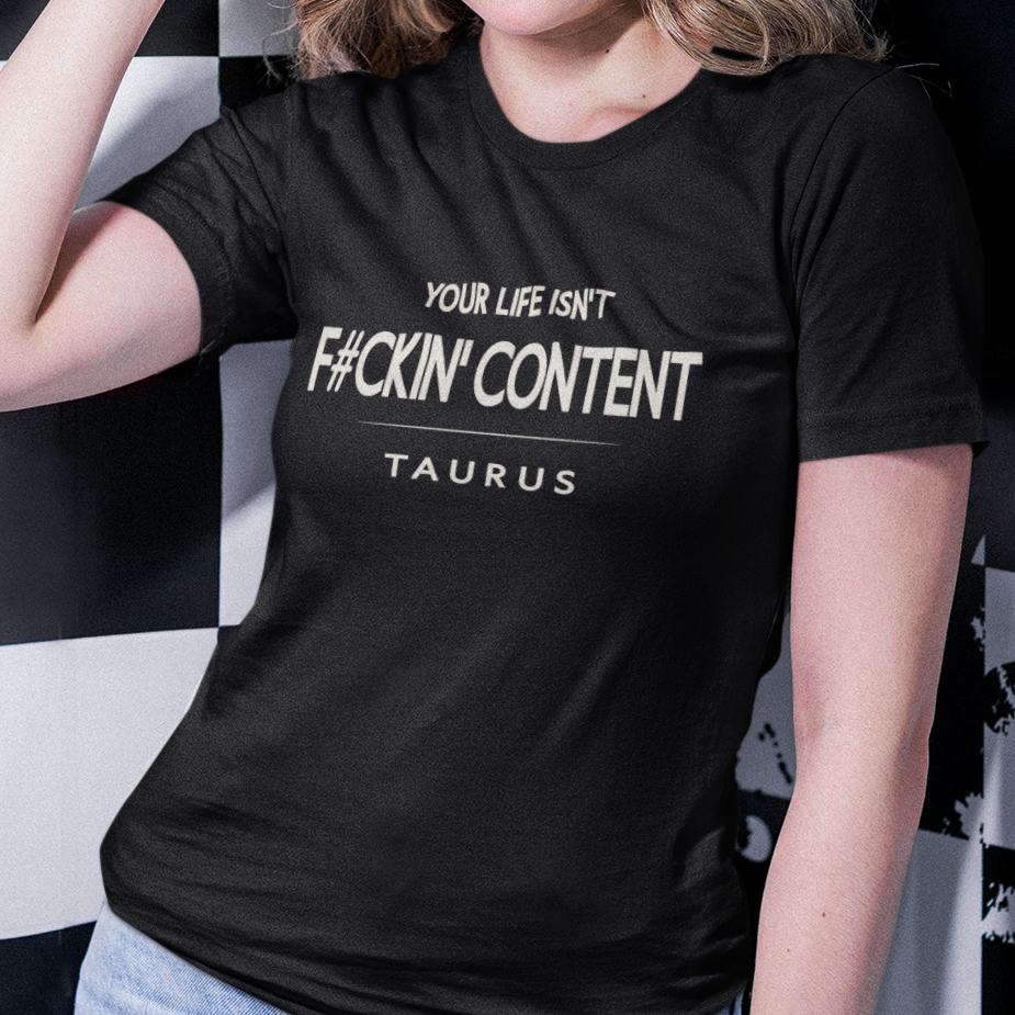 Model wearing Taurus zodiac t-shirt with Your Life Isn’t F#ckin’ Content typography.