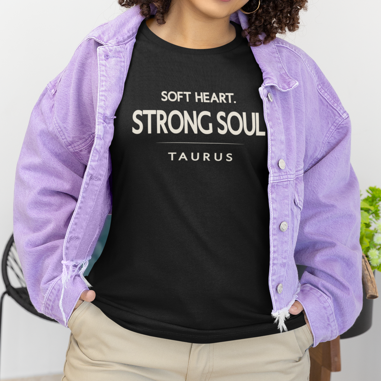 Model wearing Taurus zodiac t-shirt with “Soft Heart Strong Soul” typography quote