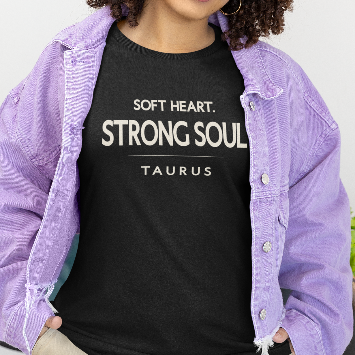 Model wearing Taurus zodiac t-shirt with “Soft Heart Strong Soul” typography quote