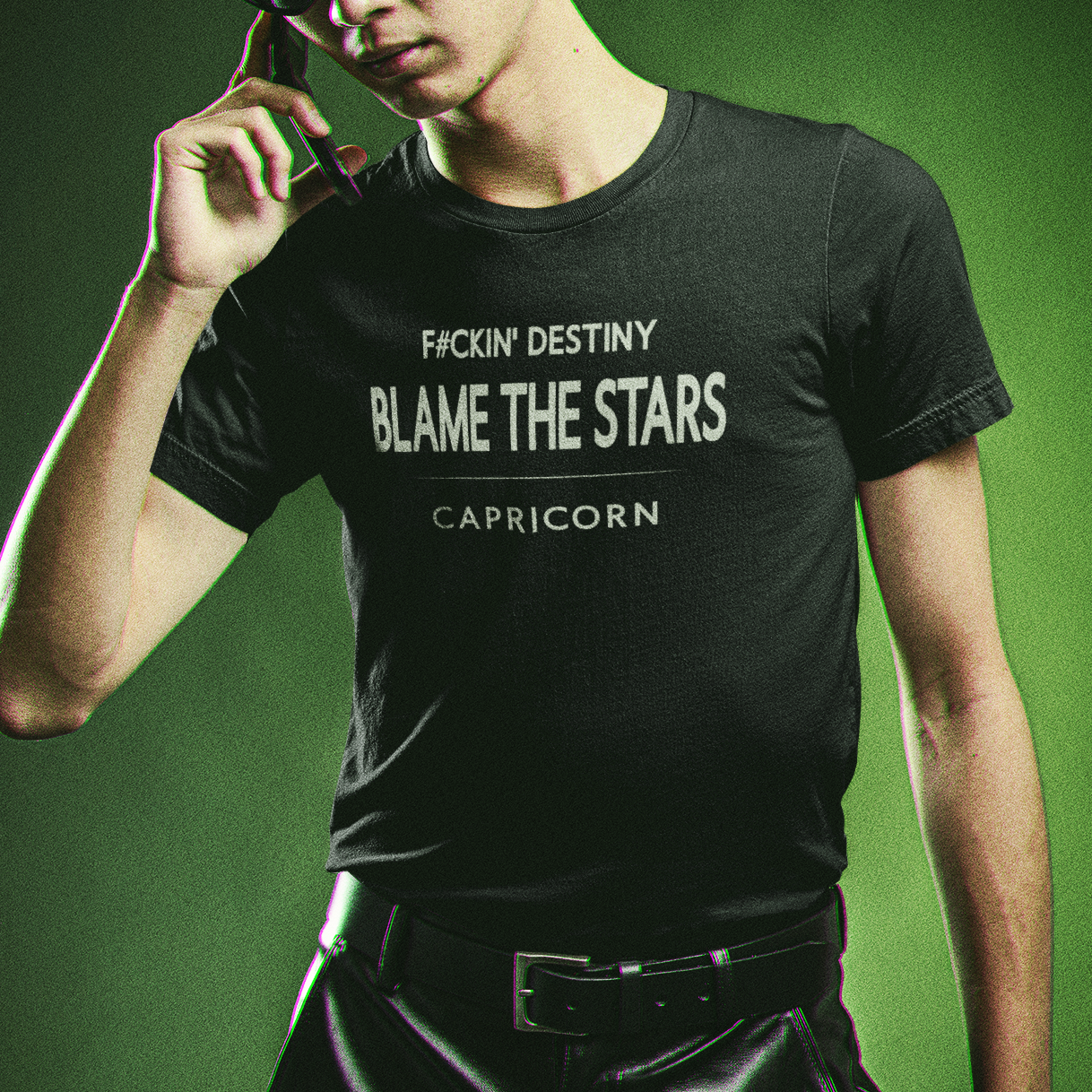 Model wearing Capricorn zodiac t-shirt with “F#CKIN' Destiny Blame the Stars” typography quote