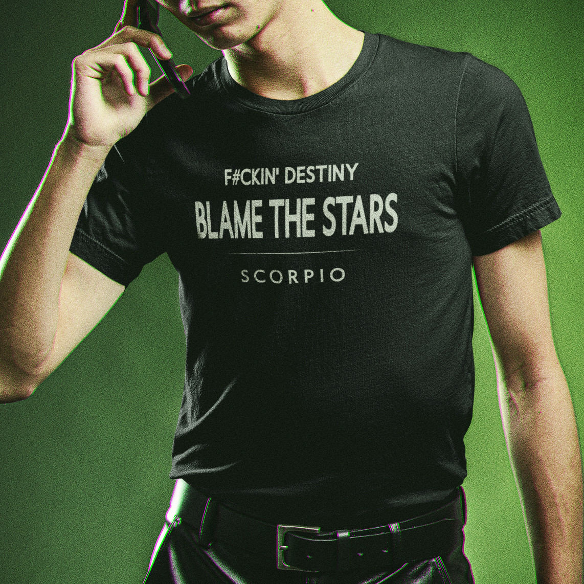 Male model wearing Scorpio zodiac t-shirt with “F#ckin’ Destiny Blame The Stars” quote