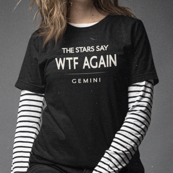 Model wearing Gemini zodiac t-shirt with “The Stars Say WTF Again” typography quote design