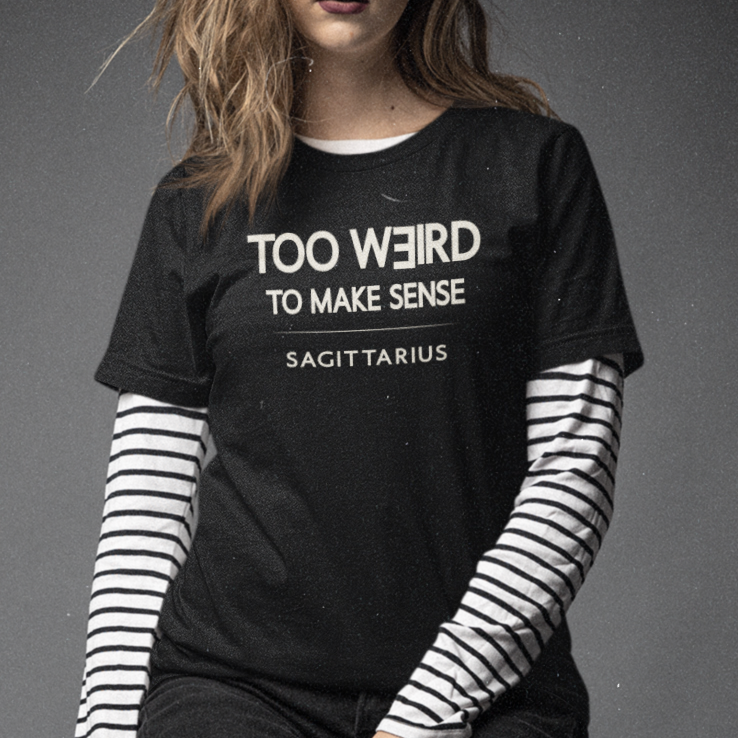 Model wearing Sagittarius zodiac t-shirt with “Too Weird to Make Sense” typography quote