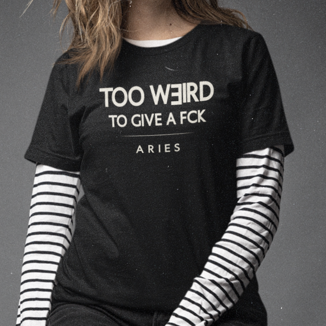 Model wearing Aries zodiac t-shirt with “Too Weird to Give a FCK” typography quote