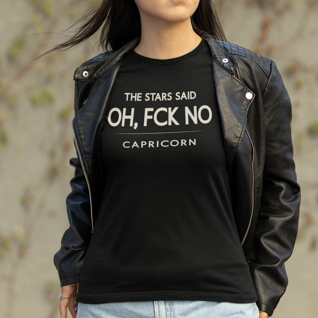 Model wearing Capricorn zodiac t-shirt with “The Stars Said Oh, FCK No” typography quote