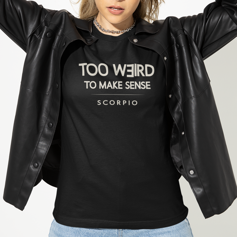 Model wearing Scorpio zodiac t-shirt with “Too Weird to Make Sense” typography quote
