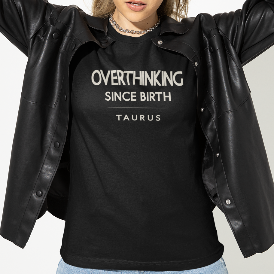 Model wearing Taurus zodiac t-shirt with “Overthinking Since Birth” typography quote design