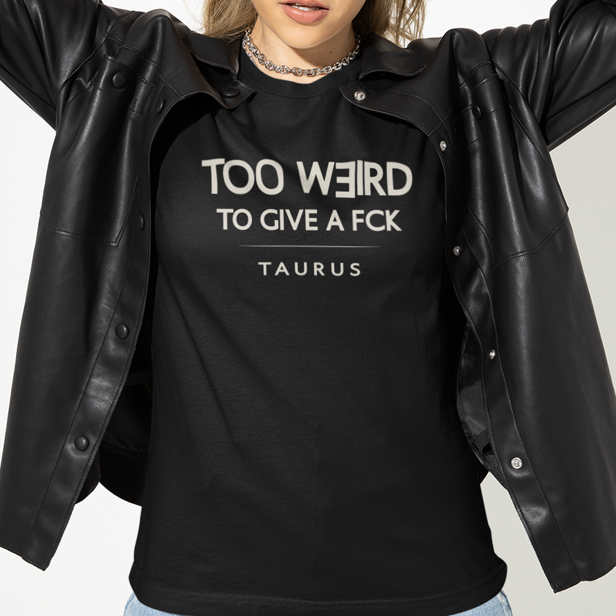 Model wearing Taurus zodiac t-shirt with “Too Weird to Give a FCK” typography quote
