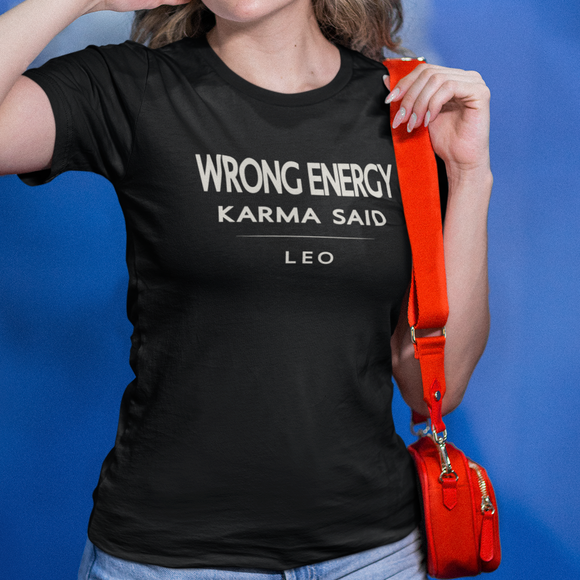 Model wearing Leo zodiac t-shirt with “Wrong Energy Karma Said” typography quote