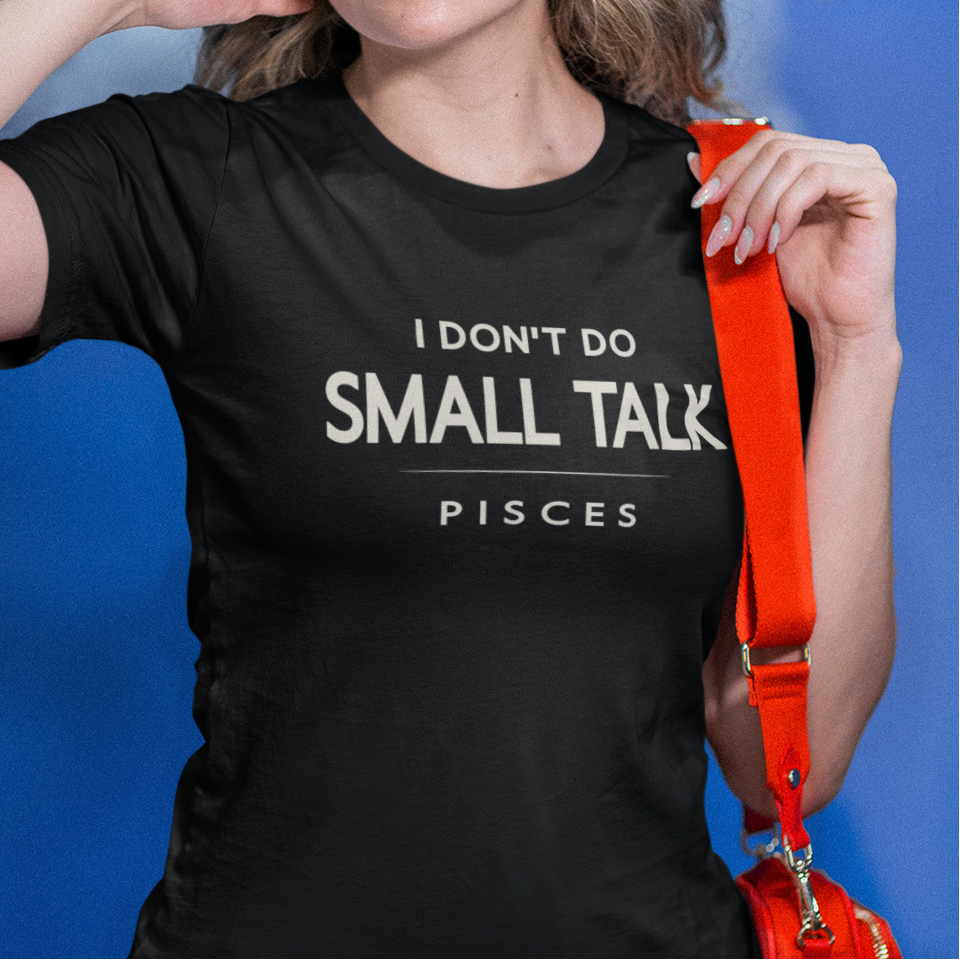 Model wearing Pisces zodiac t-shirt with “I don’t do small talk” bold typography quote design.