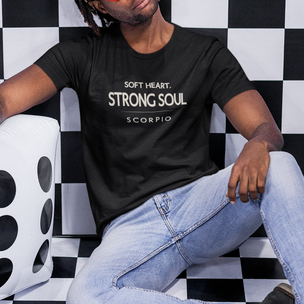 Model wearing Scorpio zodiac t-shirt with “Soft Heart Strong Soul” typography quote