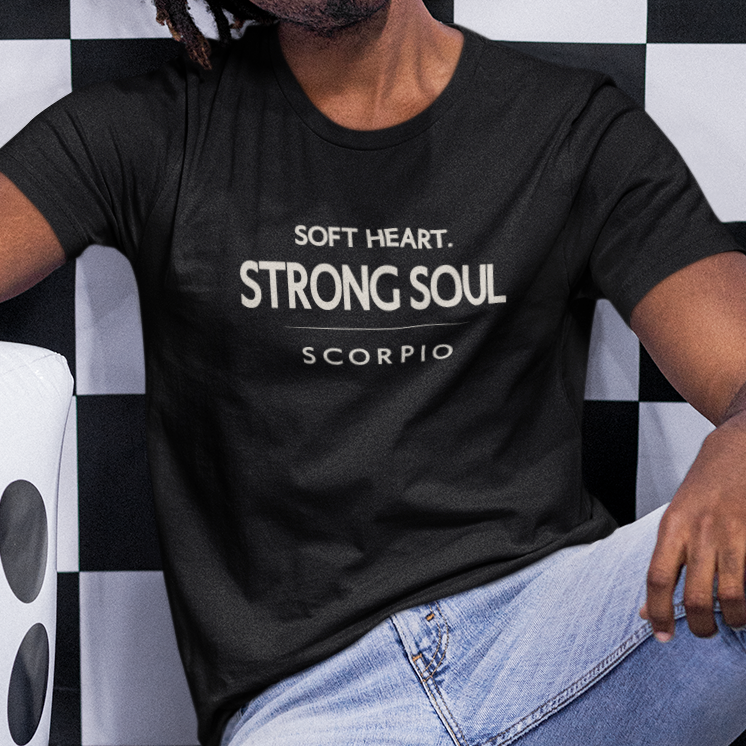 Model wearing Scorpio zodiac t-shirt with “Soft Heart Strong Soul” typography quote