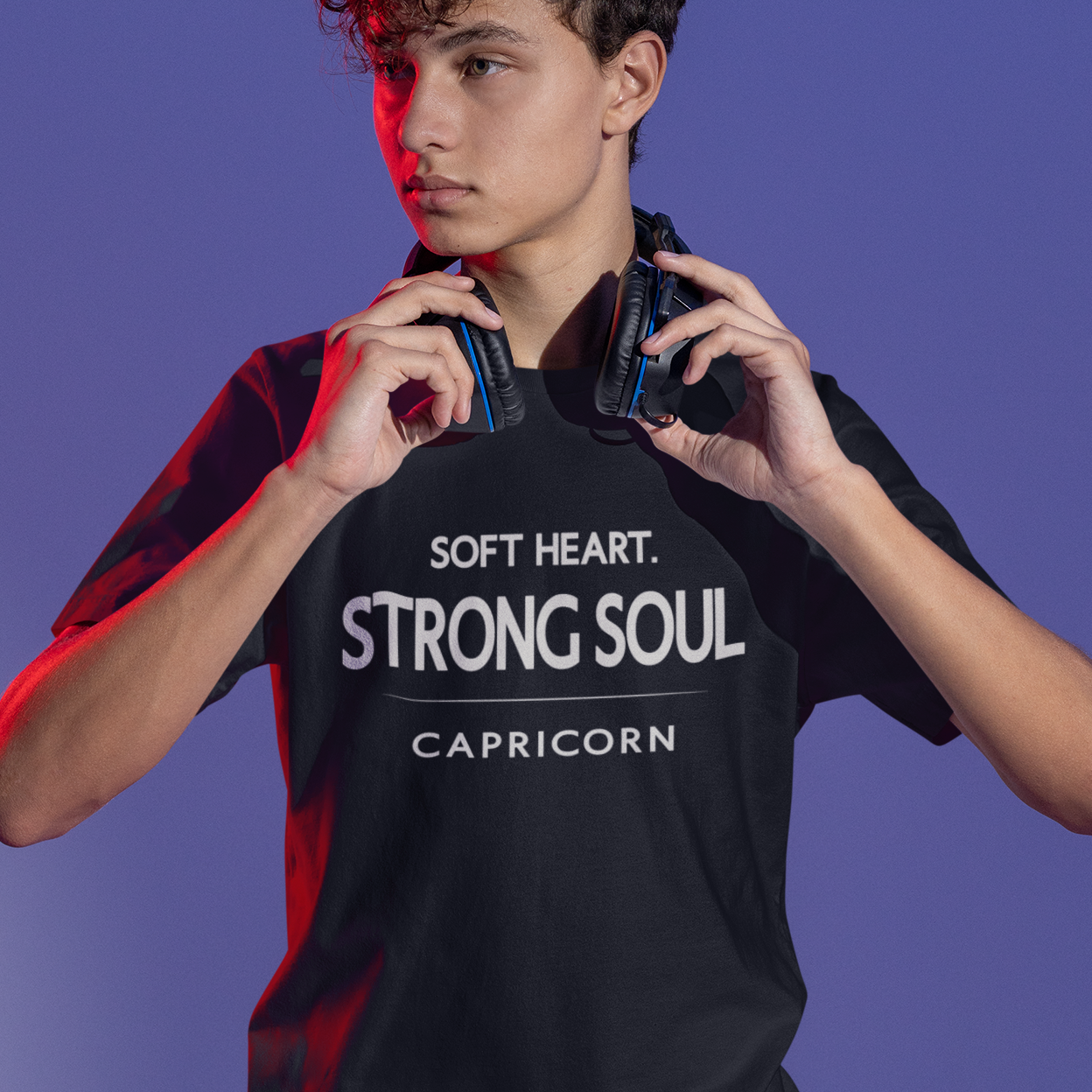 Model wearing Capricorn zodiac t-shirt with “Soft Heart Strong Soul” typography quote design