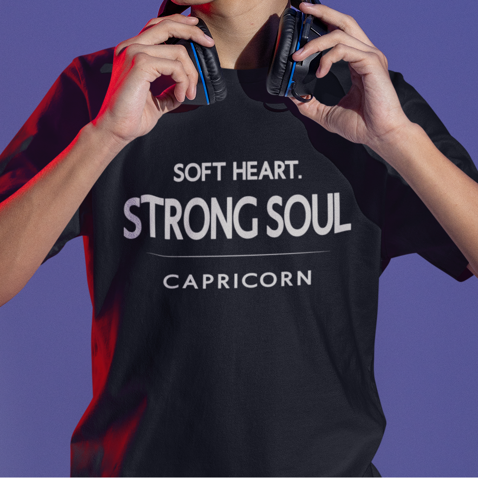 Model wearing Capricorn zodiac t-shirt with “Soft Heart Strong Soul” typography quote design