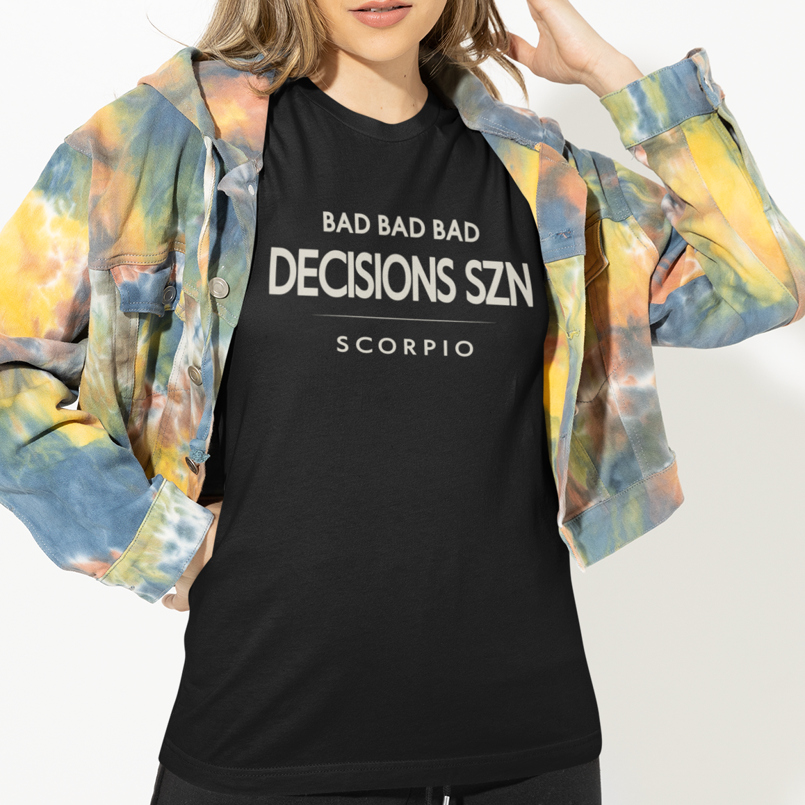 Model wearing Scorpio zodiac t-shirt with “Bad Bad Bad Decisions SZN” typography quote design