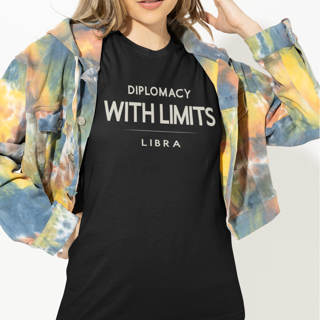 Model wearing Libra zodiac t-shirt with bold “Diplomacy With Limits” typography quote